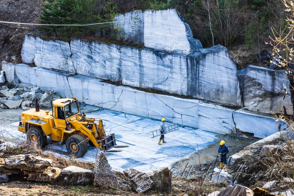 stonemason works in the marble quarry
