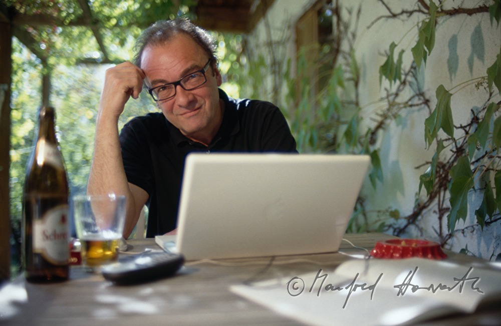writer Robert Menasse in his summer house