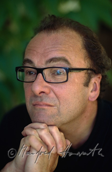 writer Robert Menasse in his summer house
