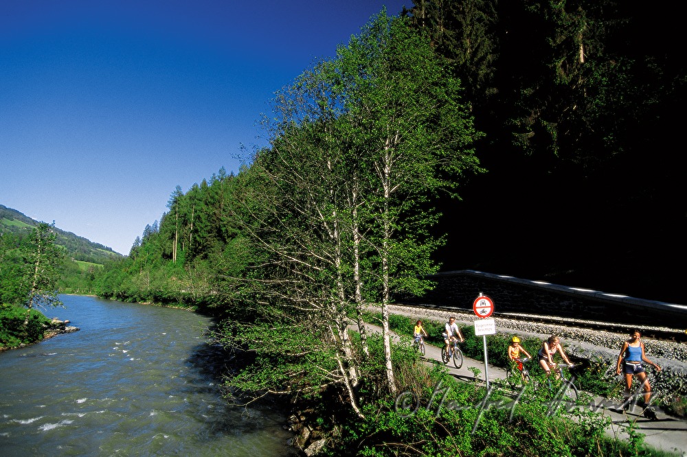 bike riders on the cycle track near the river Mur