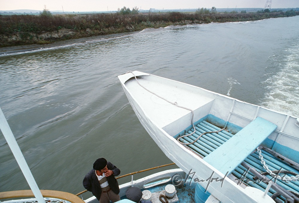 passenger on the deck of a ferry boat