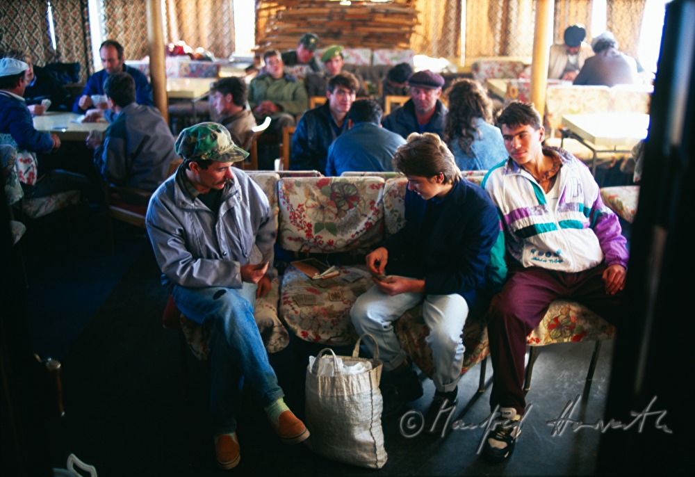 passengers in the compartment of a ferry boat