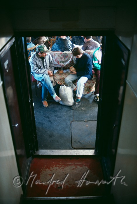 passengers in the compartment of a ferry boat