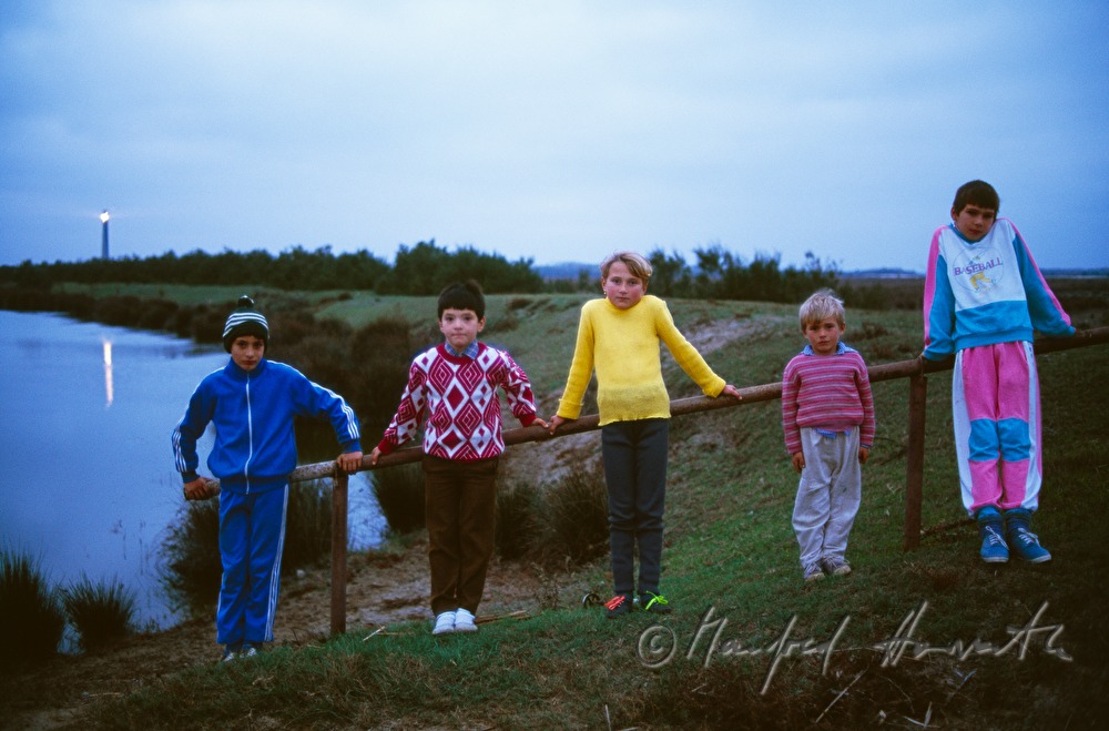 children near the lighthouse
