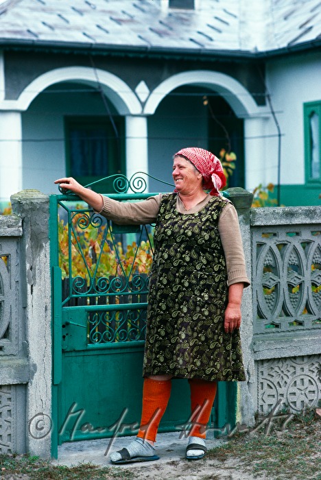 Lipovan woman in front of her house