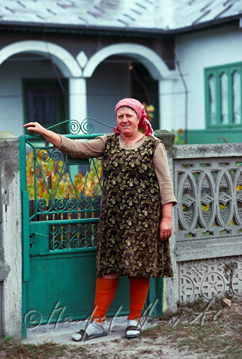 Lipovan woman in front of her house