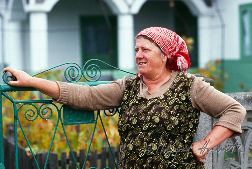 Lipovan woman in front of her house