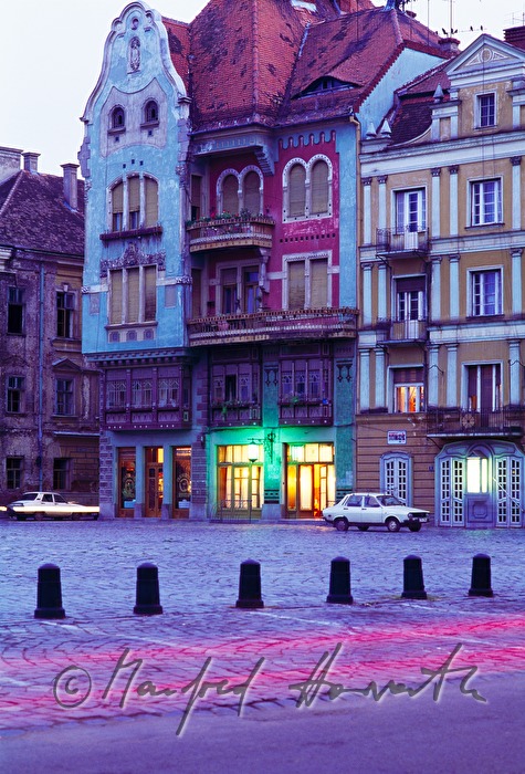 ensemble of houses and a parking car