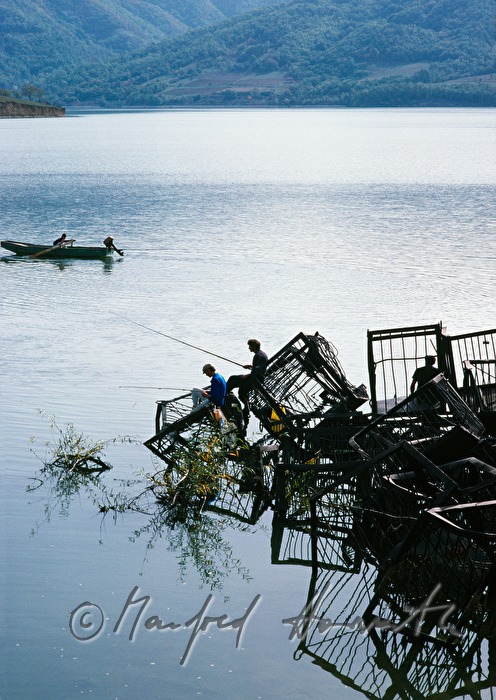 harbour with fishermen and fishing boat