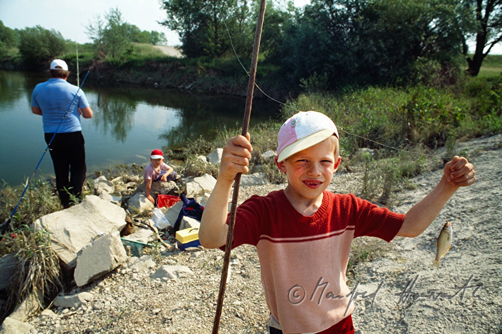 joung fisherman with his rod and bait
