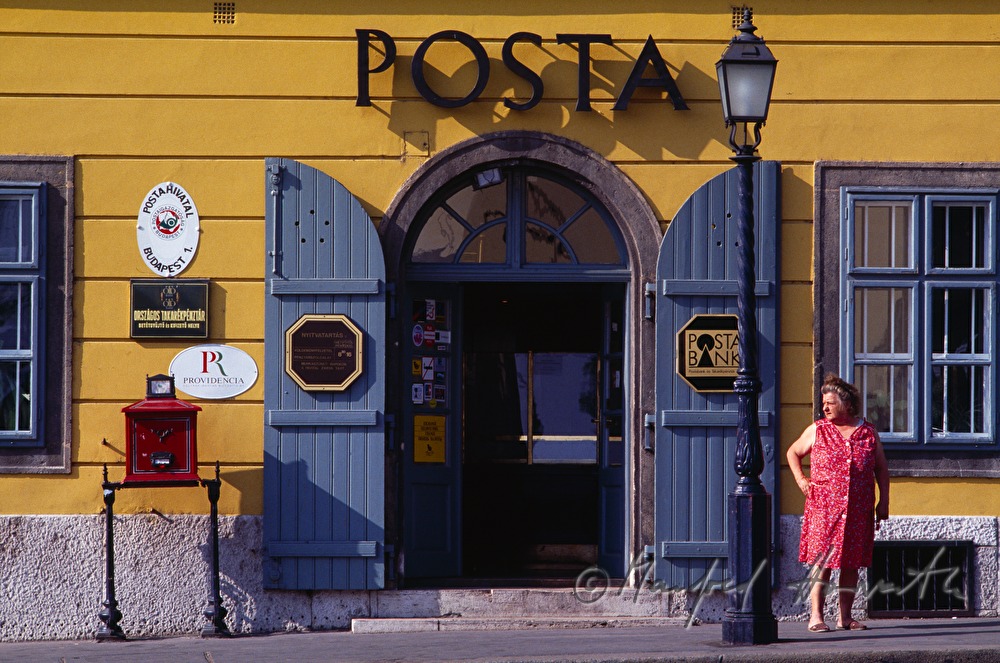 woman in front of the post office