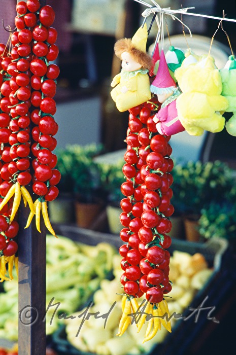 pigtail with cherry tomatoes and yellow peppers