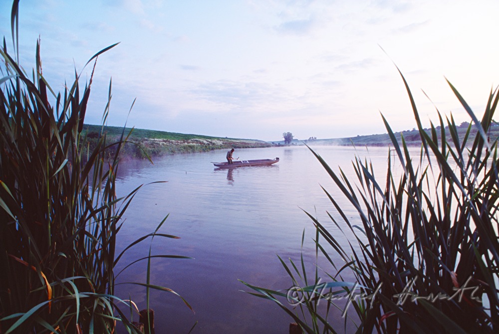 fisherman ona fish lake near the Danube