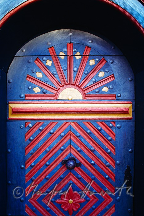 entrance of a farm house with decorative painting