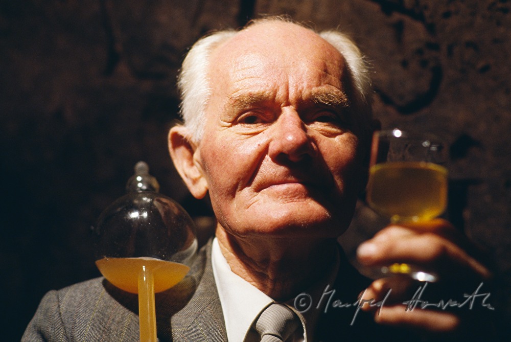 vintner takes a sample