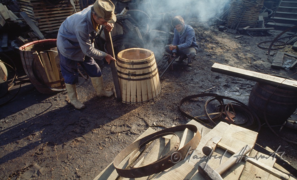 coopers making a barrel