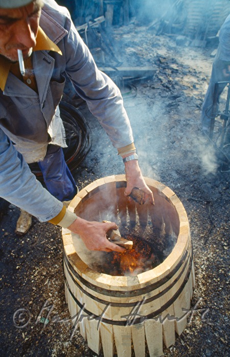 coopers making a barrel