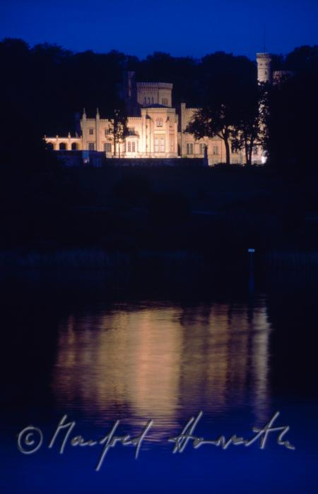 Babelsberg Palace reflects in the River Havel
