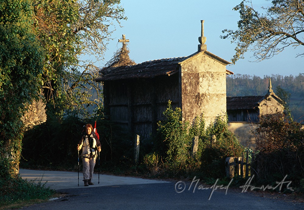 pilgrim with backpack and traditional maize drier (Hòrrero)