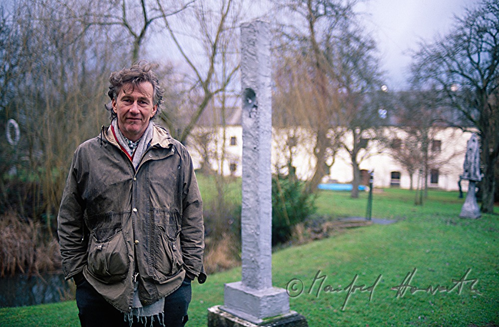 painter Gunter Damisch in his sculpture garden