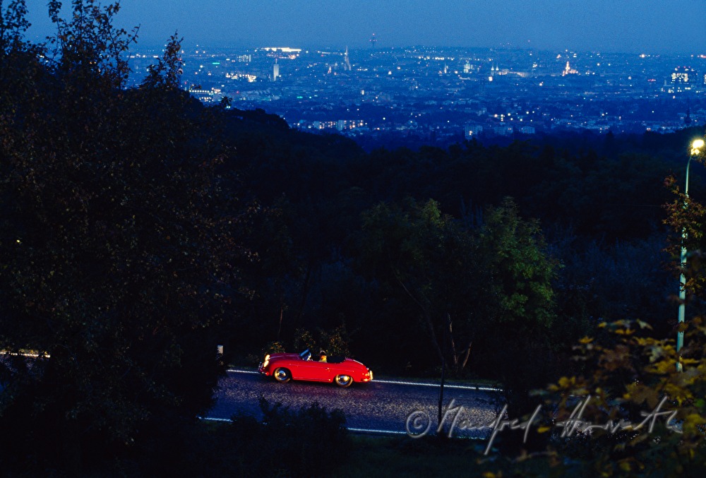Porsche and city panorama