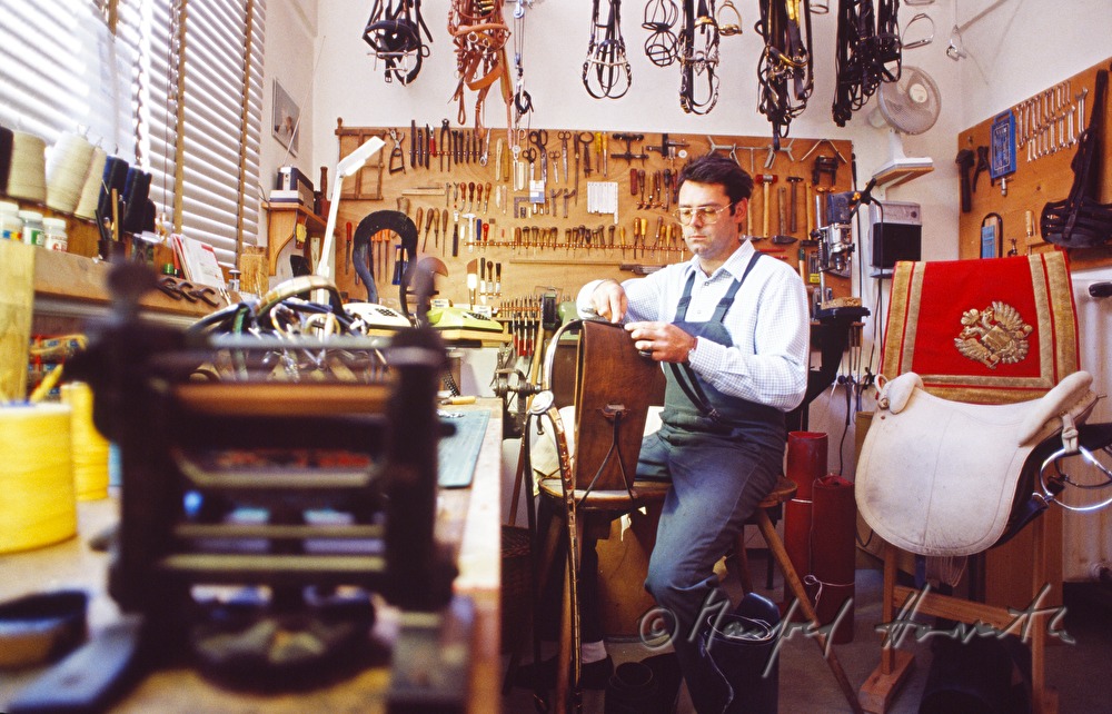 saddler in the in-house saddlery