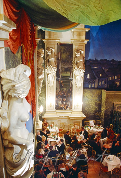 visitors of the opera ball in the restaurant