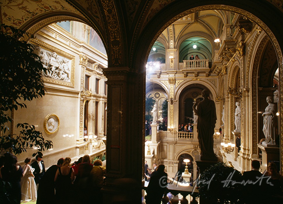 visitors of the opera ball in foyer of opera