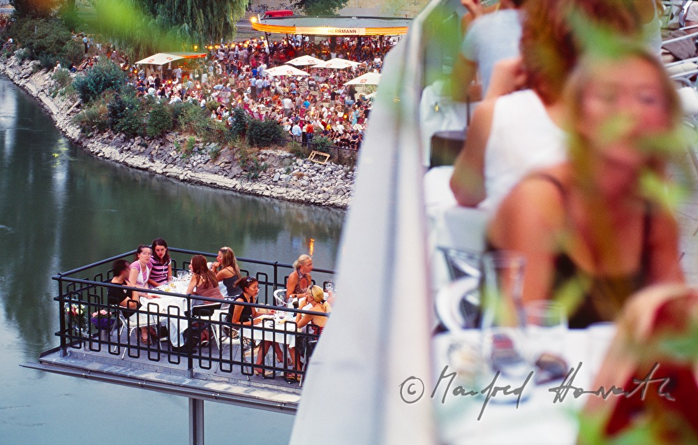 visitors on the terrace of the Urania