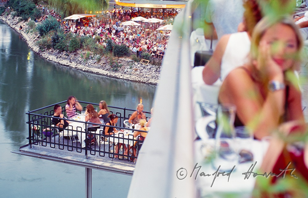 visitors on the terrace of the Urania