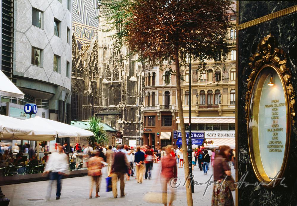 pedestrians in front of Haas Haus