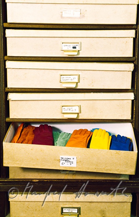 drawer with gloves in the specialised shop with different gloves