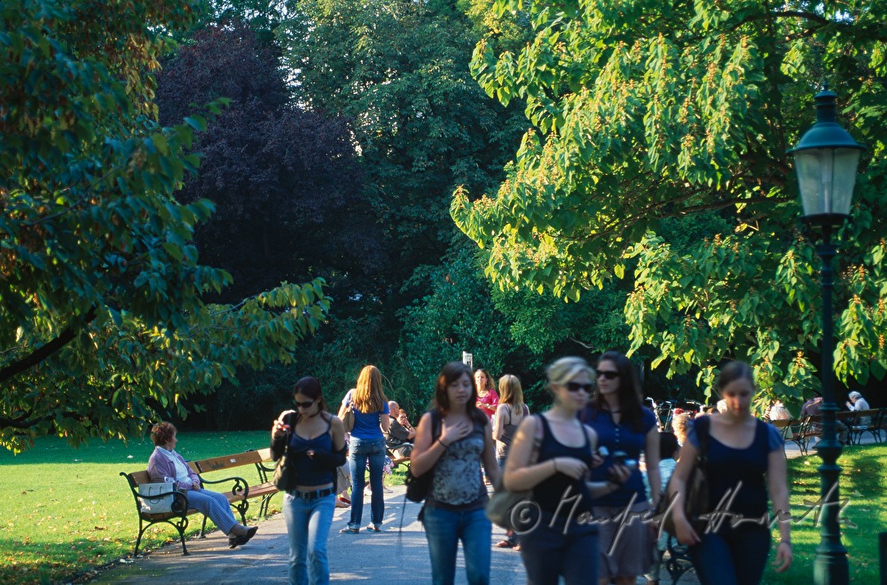 strollers near the pond