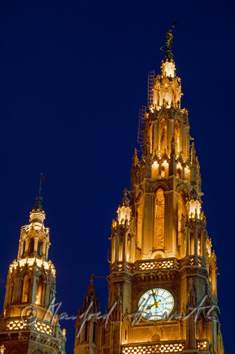 clock on the tower of the town hall