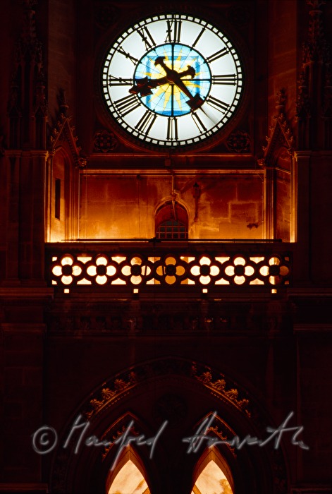 clock on the tower of the town hall