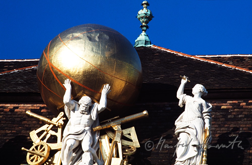 statues on the roof of the Imperial Library