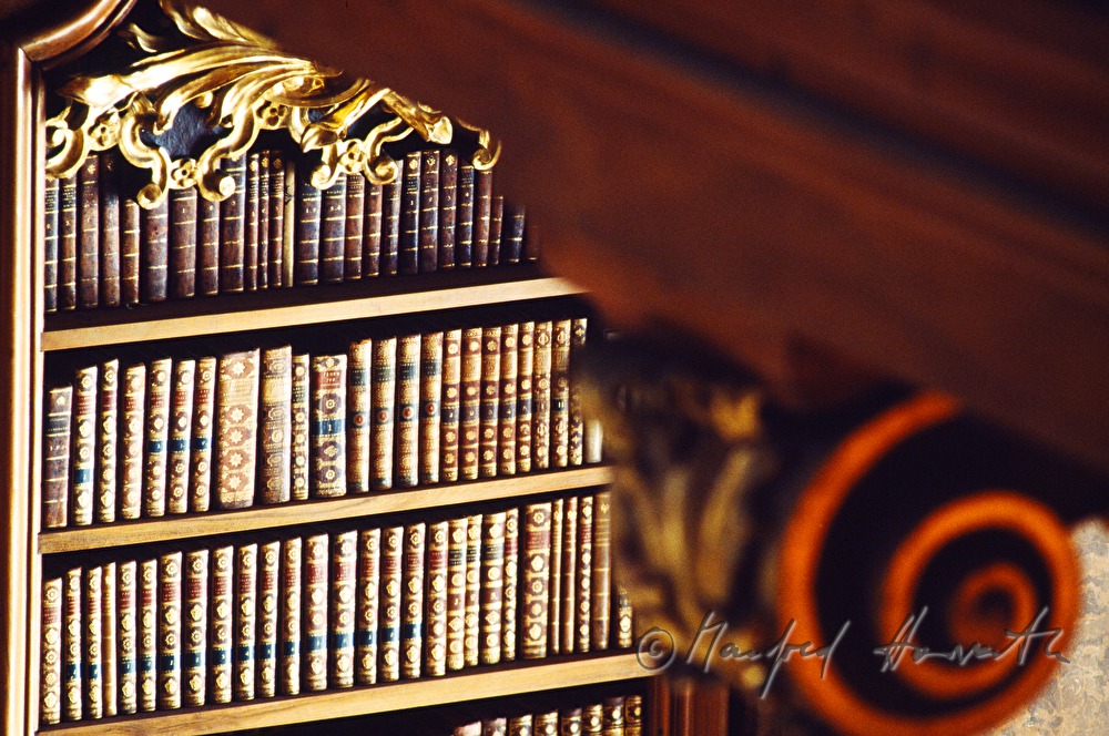 books in the shelf of the state room