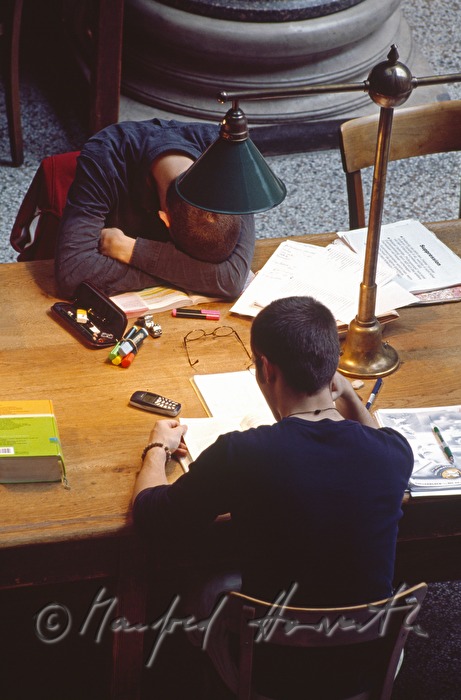 students in the reading room of the library
