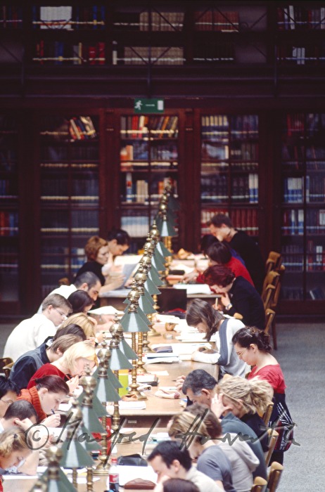 students in the reading room of the library