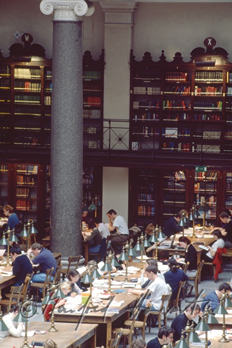 students in the reading room of the library
