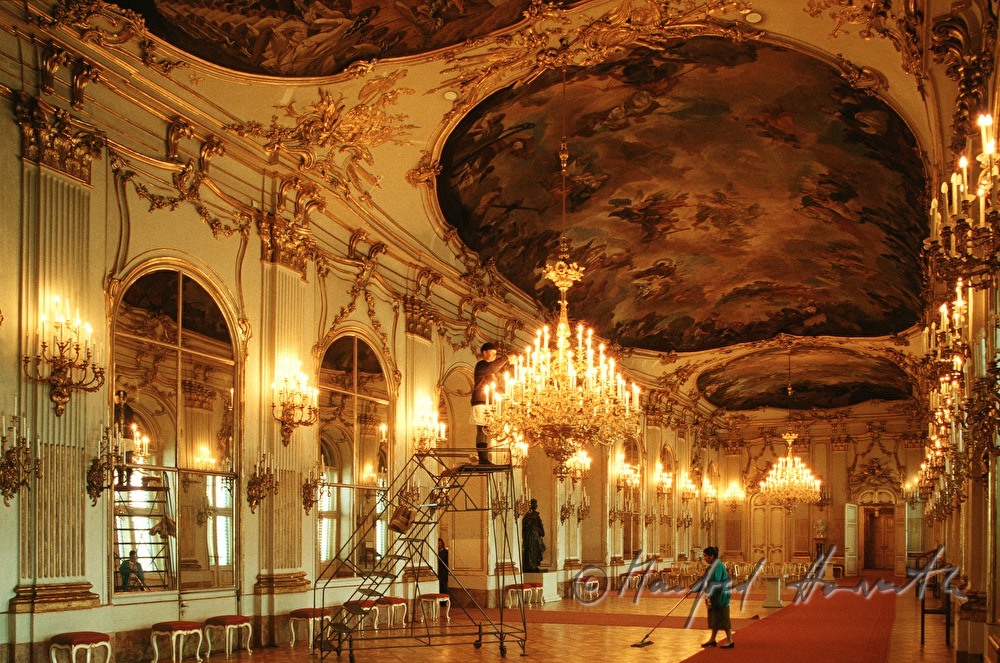 cleaning the lusters in the ballroom