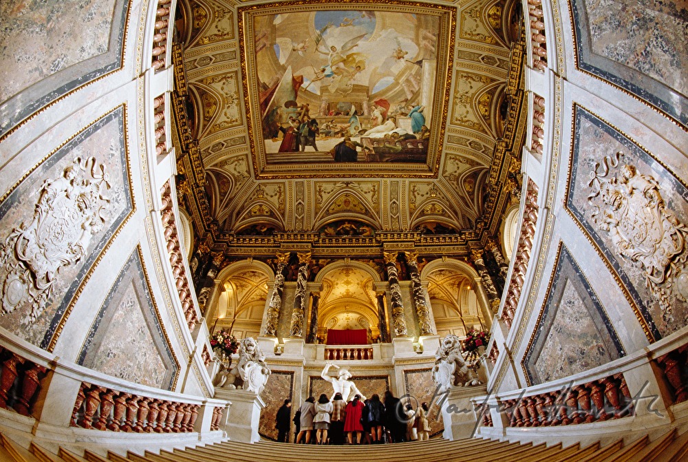 staircase with frescos