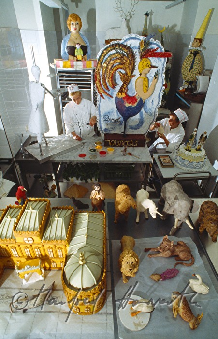 women pastry cooks preparing special cakes in the confectionary