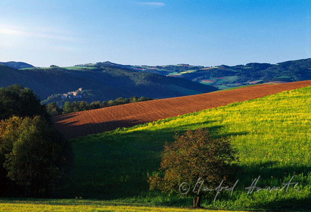 castle ruins and rolling landscape