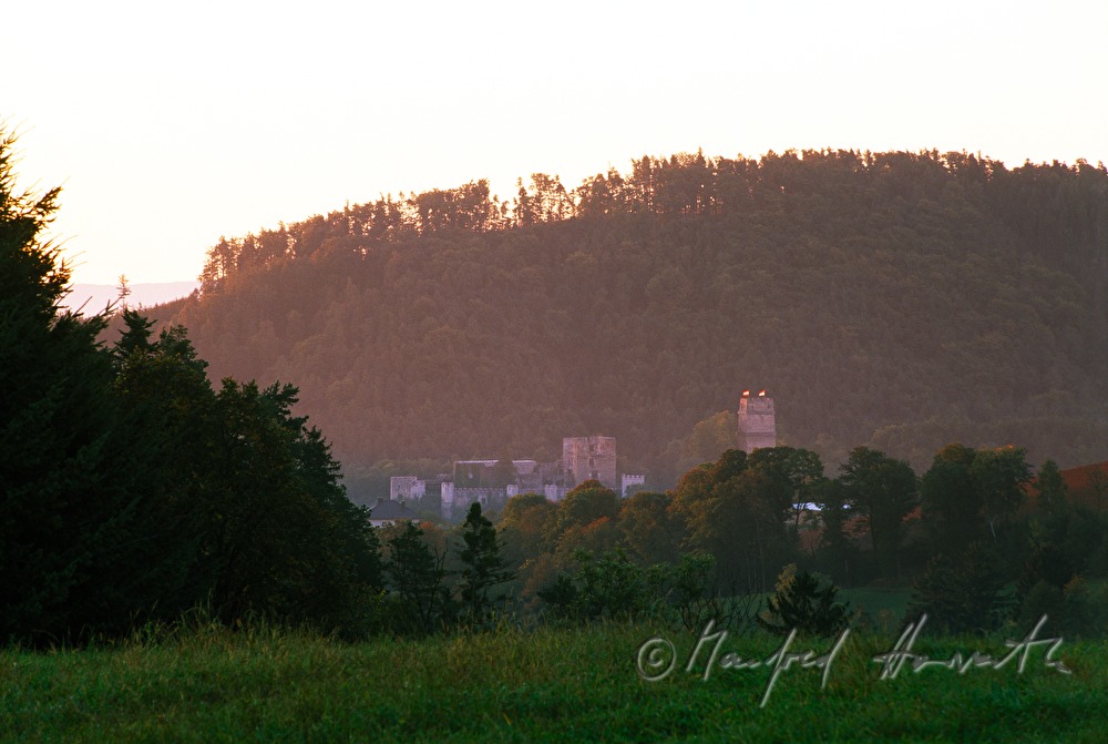 castle ruins and rolling landscape