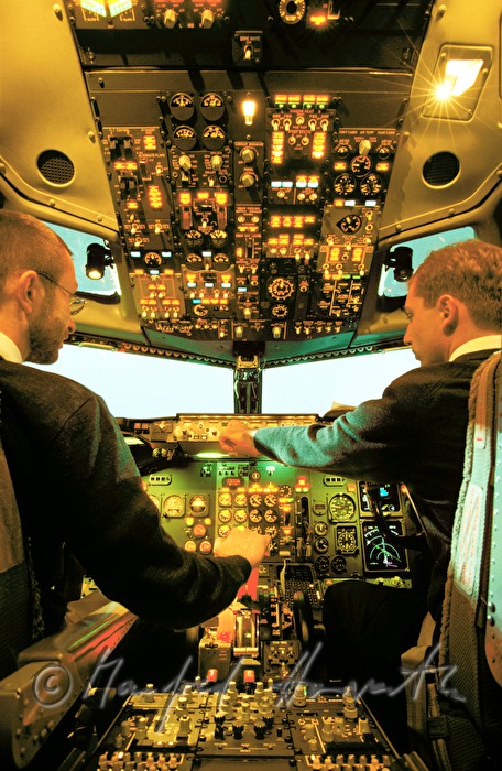 pilot and copilot check the instruments in jumbo