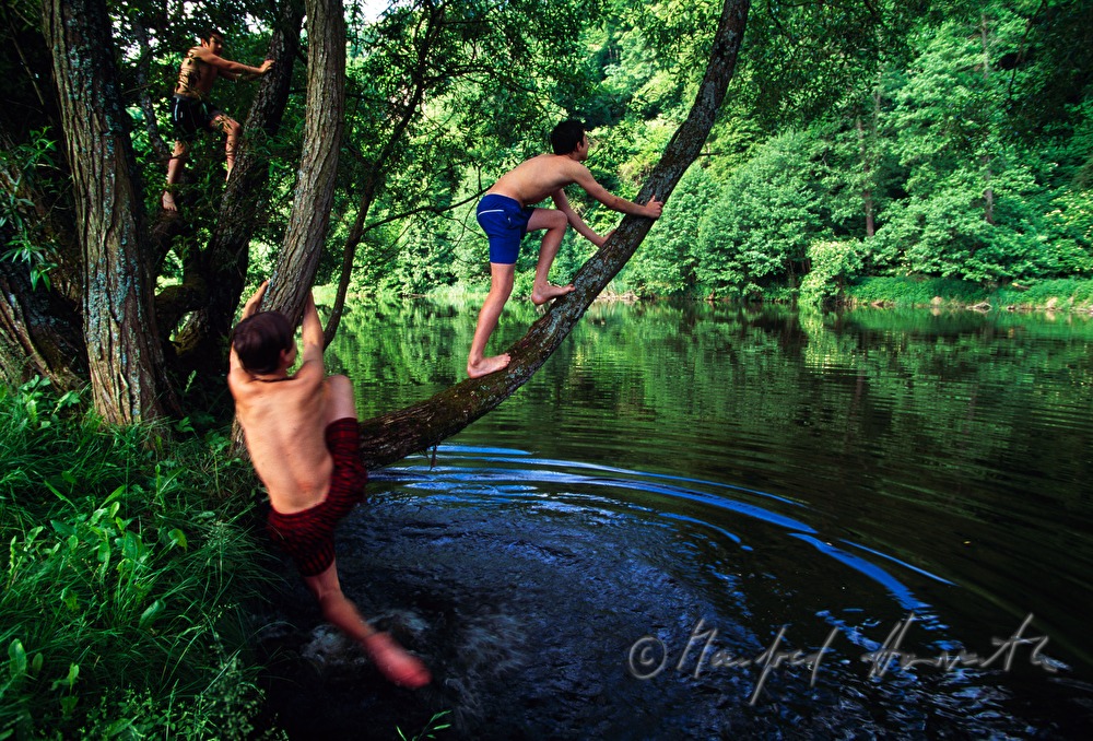 boys playing on the shore of river Thaya