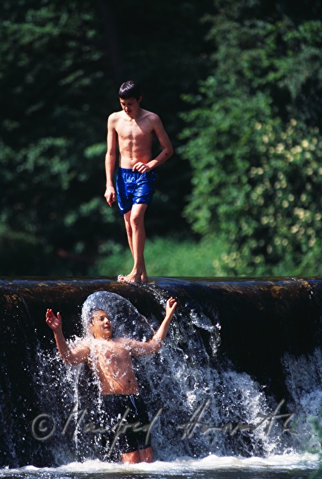 boys playing on the shore of river Thaya
