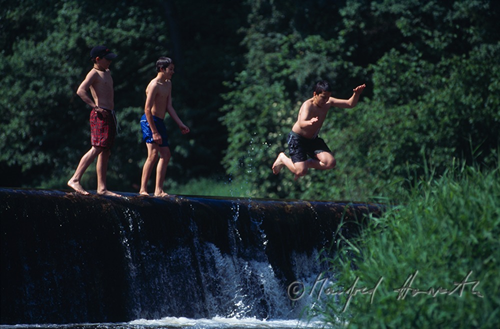 boys playing on the shore of river Thaya