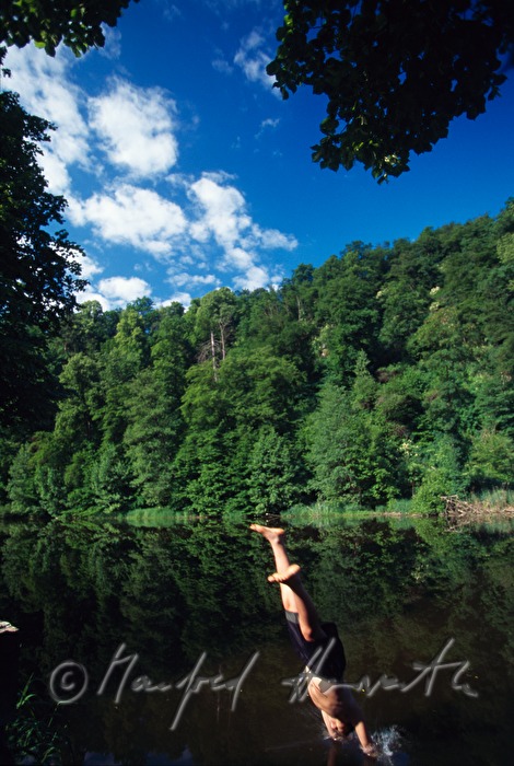 boy dives into the river Thaya